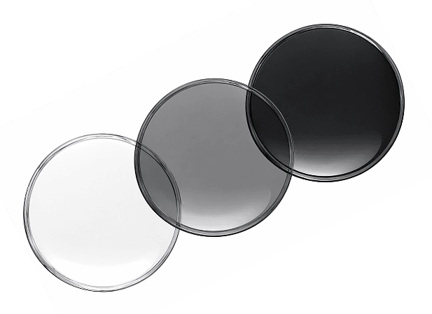 Three photochromic lens samples showing light/dark transition